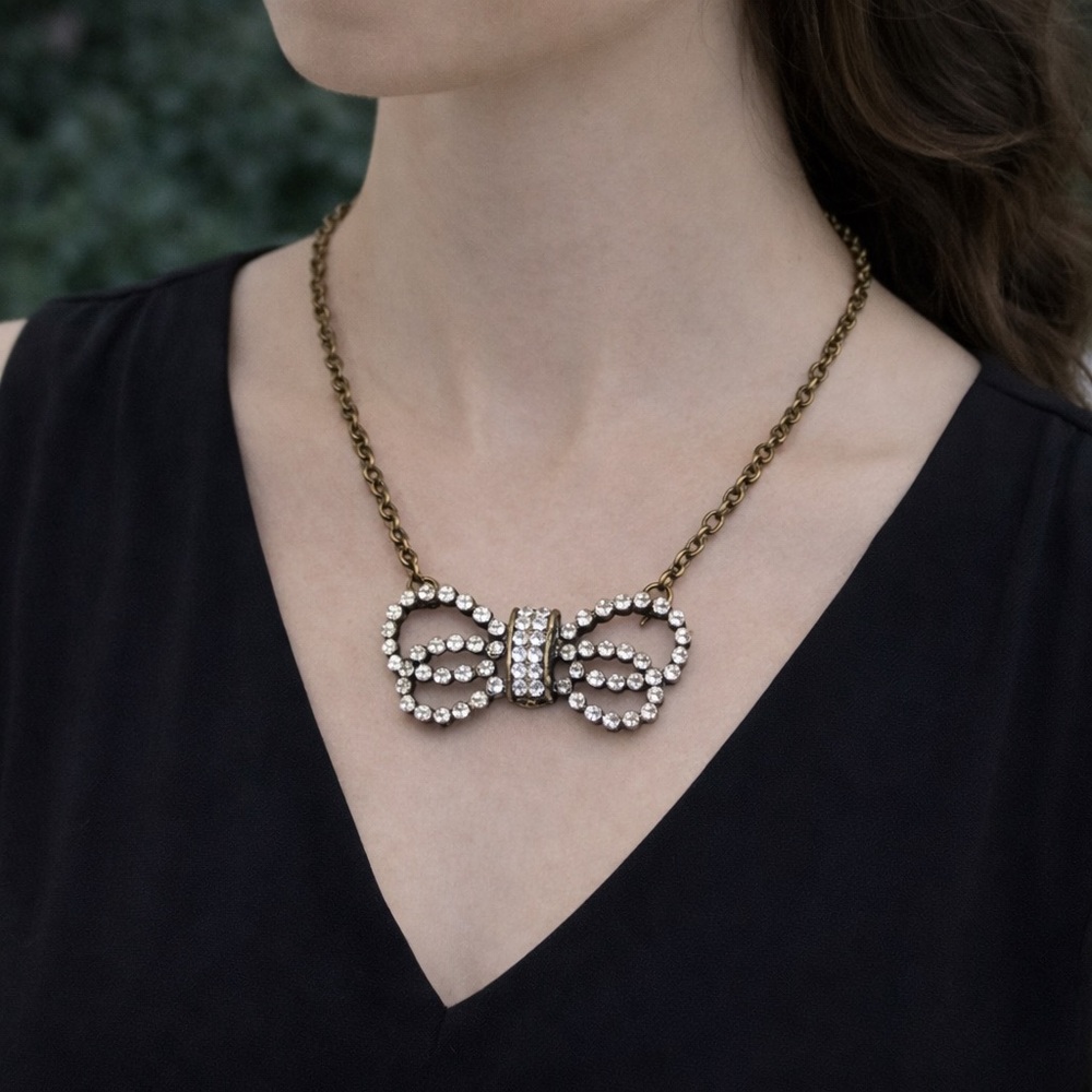 Vintage 90s Rhinestone Bow Necklace Brass Tone Glam Pendant 18”